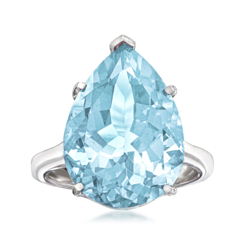 Sterling silver ring with large sky-blue oval topaz center stone and four-prong setting