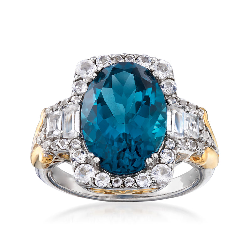 Two-tone sterling silver ring with oval London blue topaz center and white stone halo