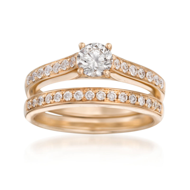 14kt yellow gold diamond bridal set with round center stone and two pave bands