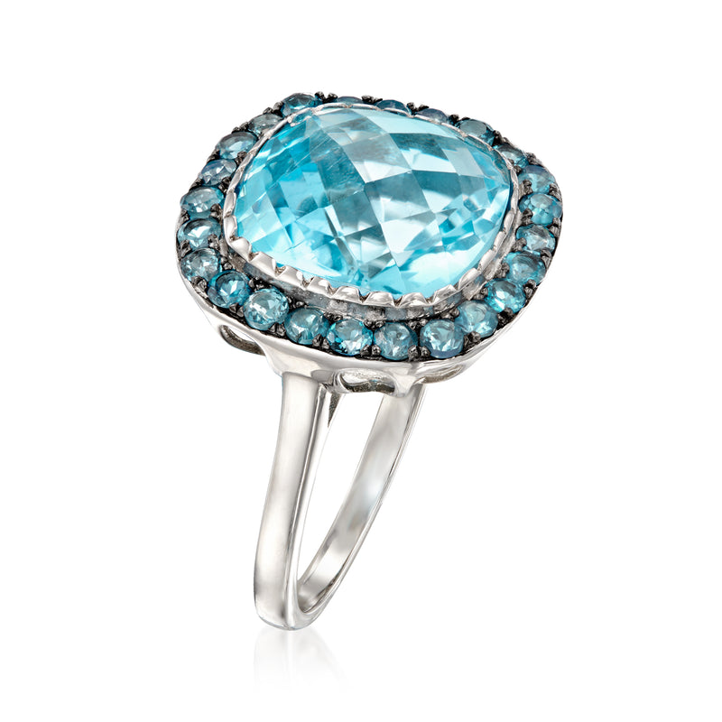 Oval sky-blue topaz ring in sterling silver with blue gemstone halo and slim band