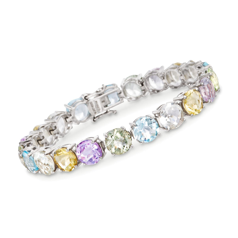 Sterling silver tennis bracelet with multi-color oval stones in prong settings