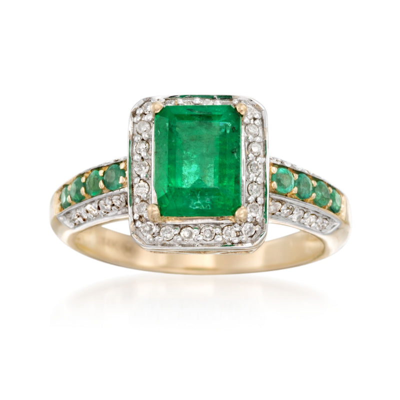Emerald and diamond ring in 14kt yellow gold with square green gemstone and halo