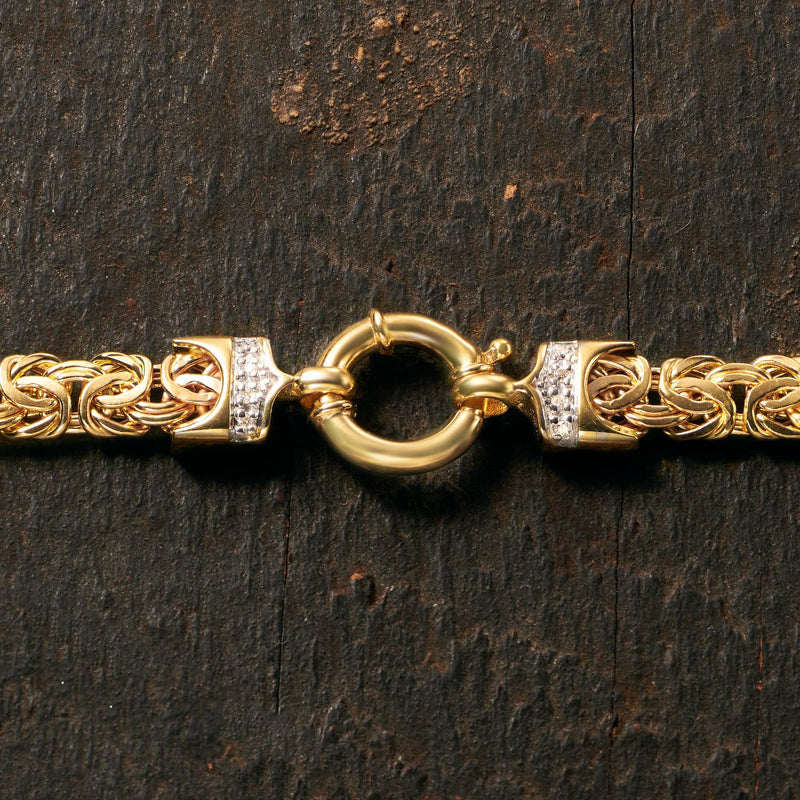 Gold ring clasp with diamond-set links on Byzantine chain