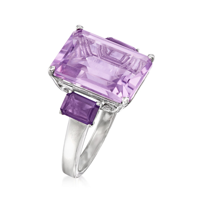 Sterling silver amethyst ring with emerald-cut rectangular stones, angled view