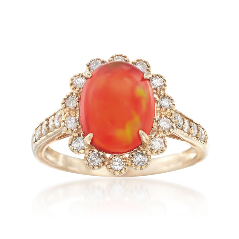 14kt yellow gold ring with oval fire opal and round diamond halo