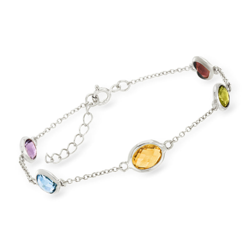 Sterling silver station bracelet with bezel-set gems: red, green, yellow, blue, pink