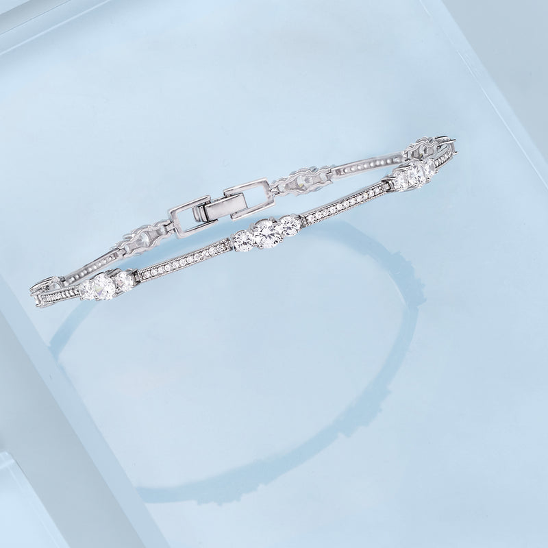 Sterling silver CZ station bracelet with box clasp and linked stone rows
