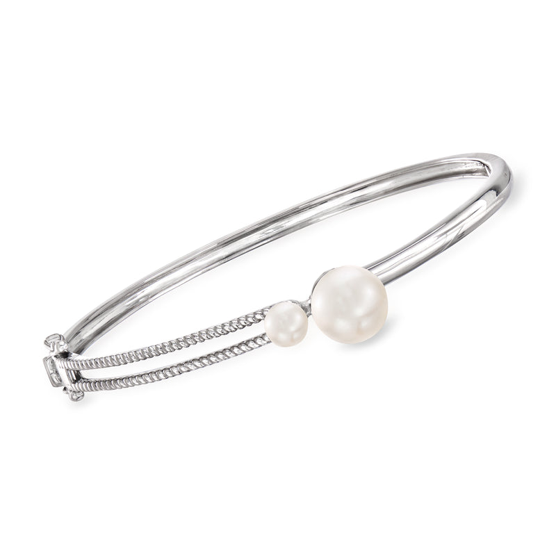Sterling silver cultured pearl bangle bracelet with two small and one large white pearls