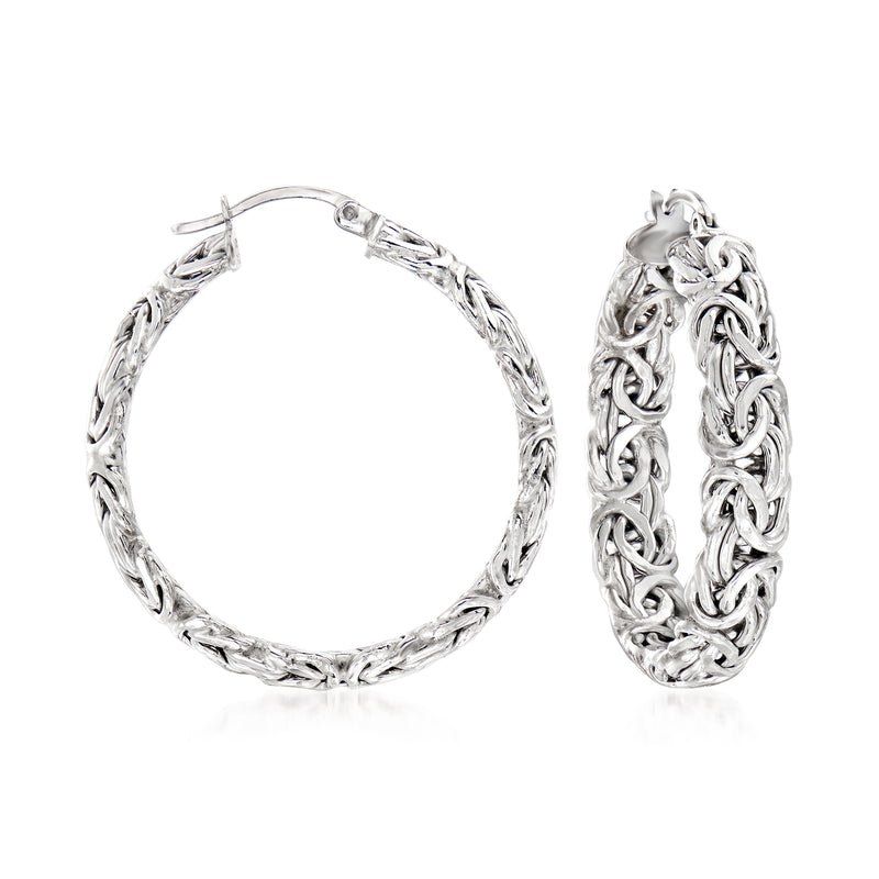 Large silver hoop earrings with Byzantine link pattern, hinged clasp