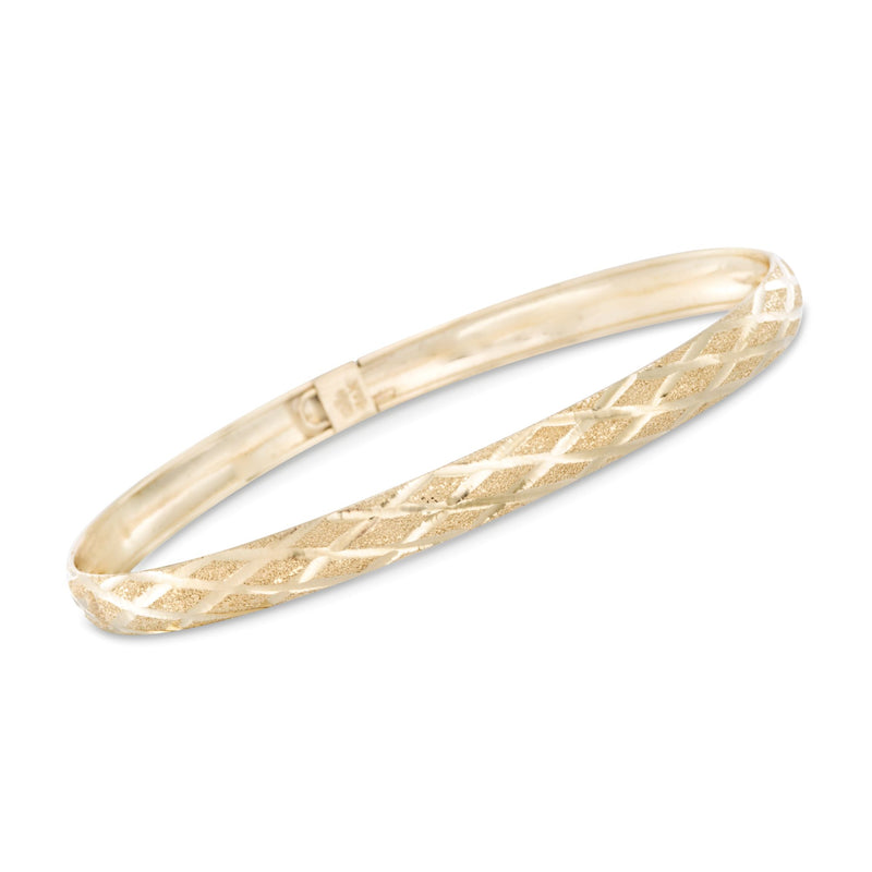 14kt yellow gold bangle bracelet with crisscross pattern