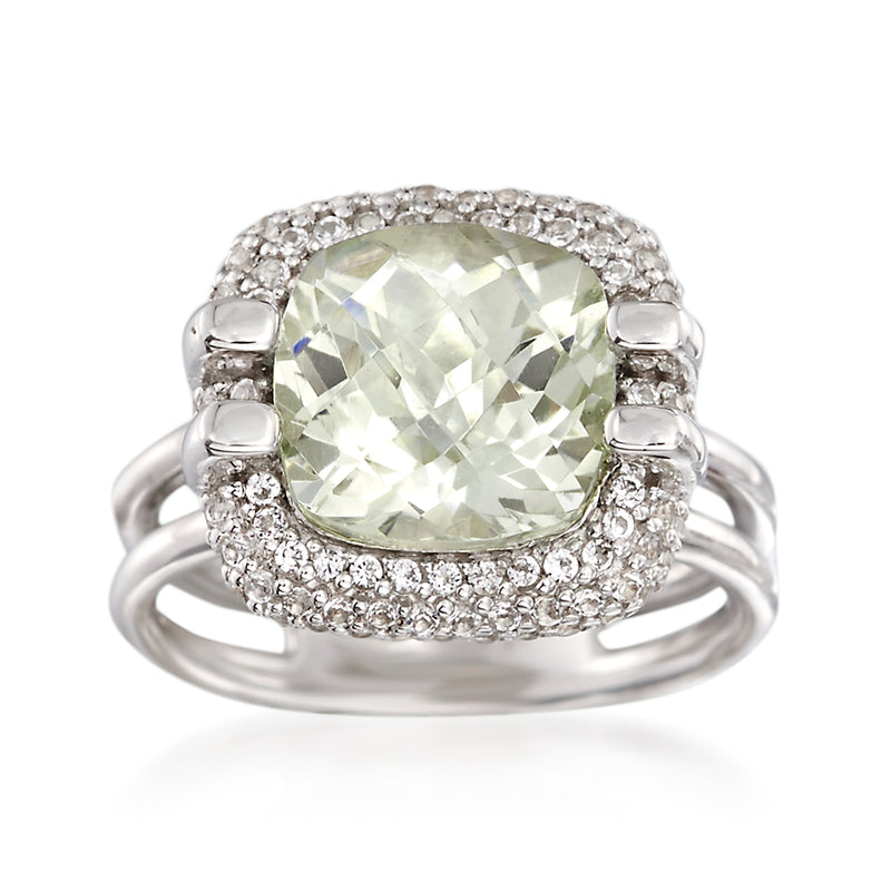 Sterling silver oval green gemstone ring with white gemstone halo and prong details