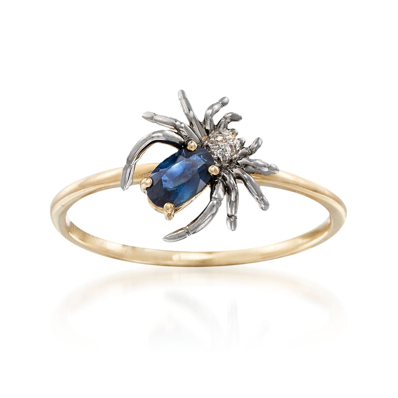 14kt yellow gold sapphire spider ring with oval blue center and sparkling stone legs