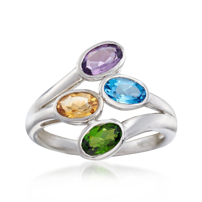 Sterling silver bypass ring with three oval stones: purple, blue, and green