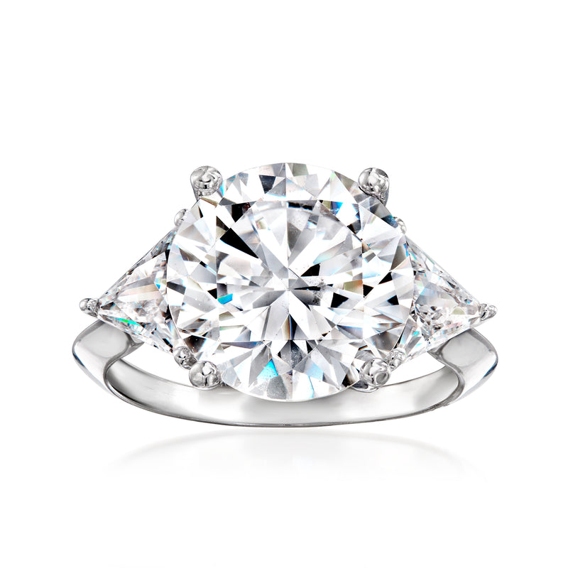Sterling silver CZ ring with oval center stone and three-stone halo