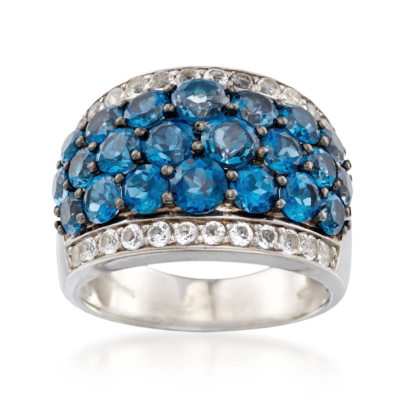 Sterling silver ring with blue and clear topaz gemstone cluster and halo detail