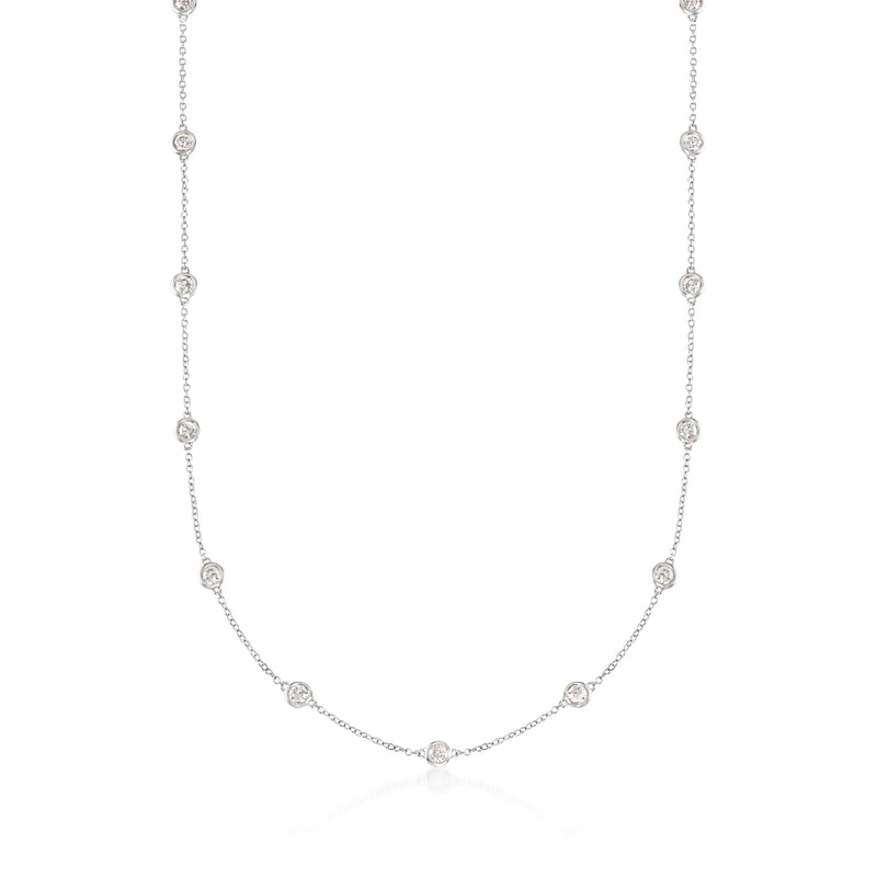 14kt white gold diamond station necklace with bezel-set round stones, station links