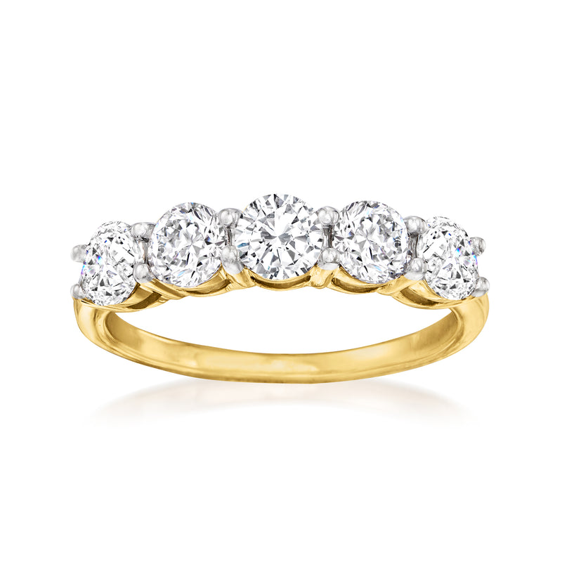 Yellow gold five-stone diamond ring with five round stones on a polished band