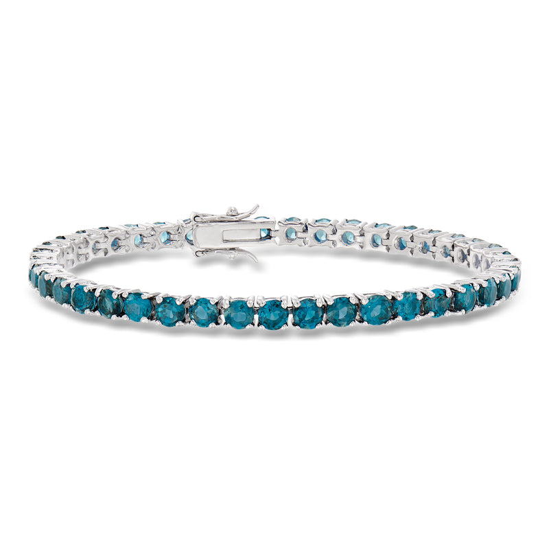 Sterling silver tennis bracelet with round London blue topaz stones, hinged clasp