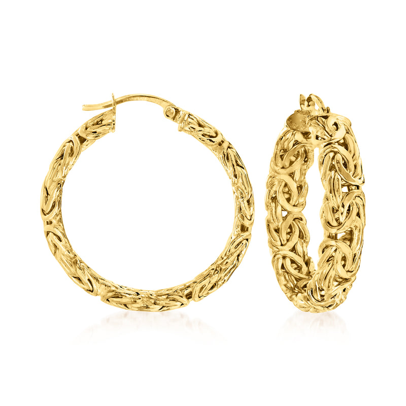 Medium gold hoop earrings with Byzantine link pattern, hinge backing visible
