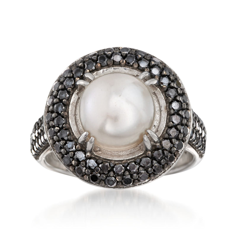 Sterling silver ring with round cultured pearl center and black spinel halo, split shank.