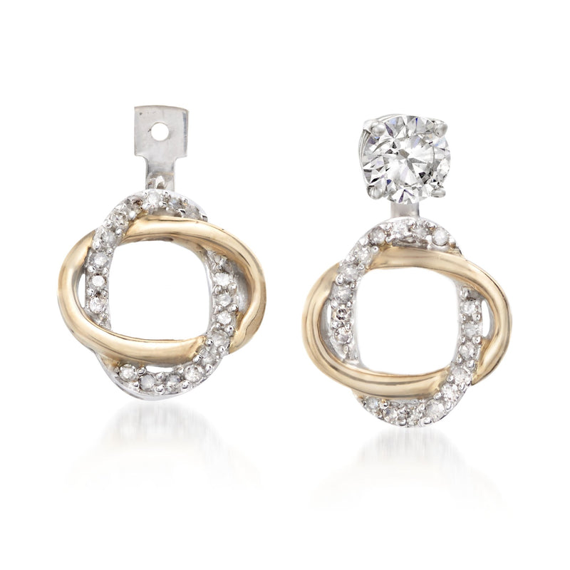 Diamond earring jackets in 14kt two-tone gold with oval diamond halos