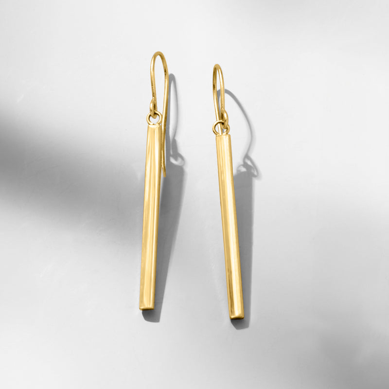 Yellow gold linear drop earrings with hoop earwire and slim rectangular bars