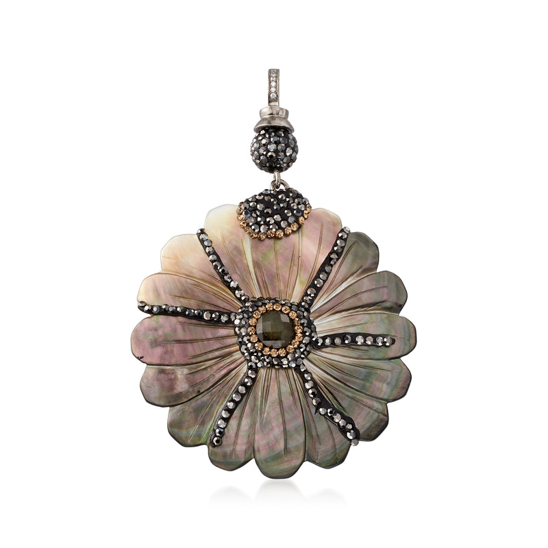 Sterling silver flower pendant with gemstone accents and iridescent petals