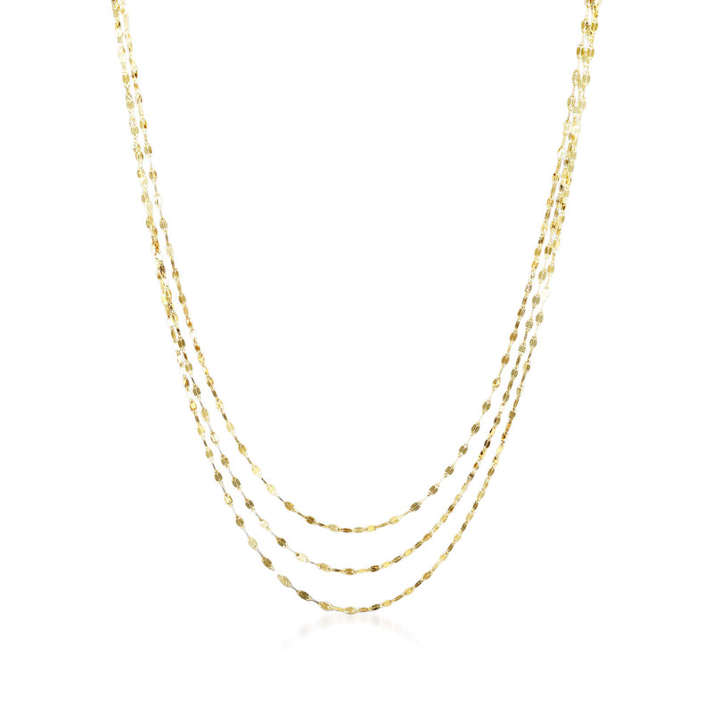14kt yellow gold three-strand Lumachina chain necklace, layered strands close-up