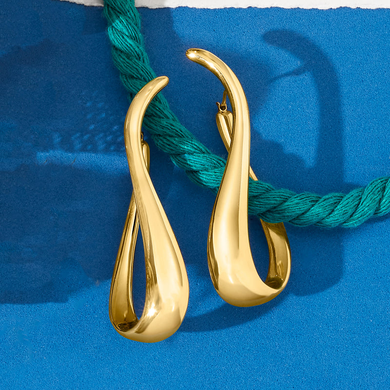 Twisted gold hoop earrings with hinged backs, smooth glossy teardrop loop