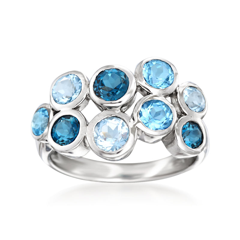 Sterling silver bubble ring with oval blue topaz stones in mixed tonal sizes
