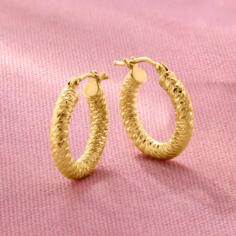 Diamond-cut 14kt yellow gold hoop earrings, oval hoops with clasp backs