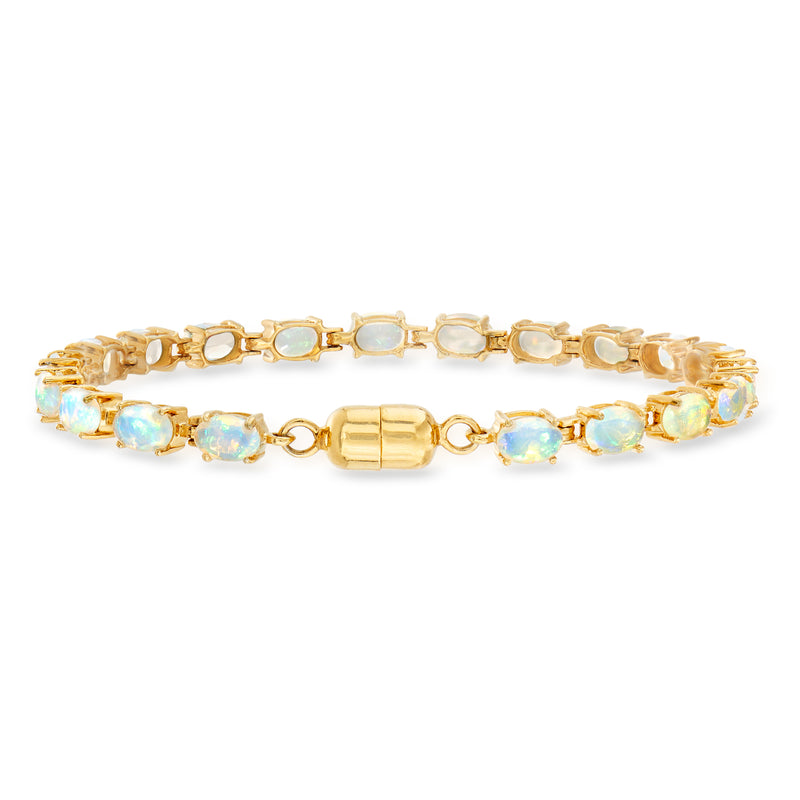 18kt gold over sterling tennis bracelet with light opal-like oval stones