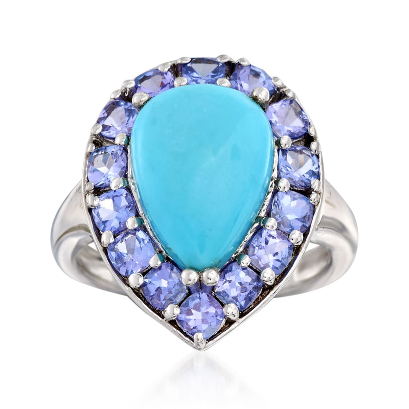 Sterling silver ring with oval turquoise center and purple gemstone halo
