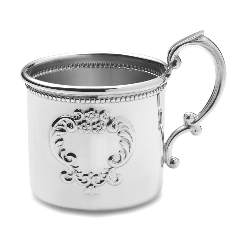 Pewter beaded baby cup with scalloped rim and decorative floral medallion