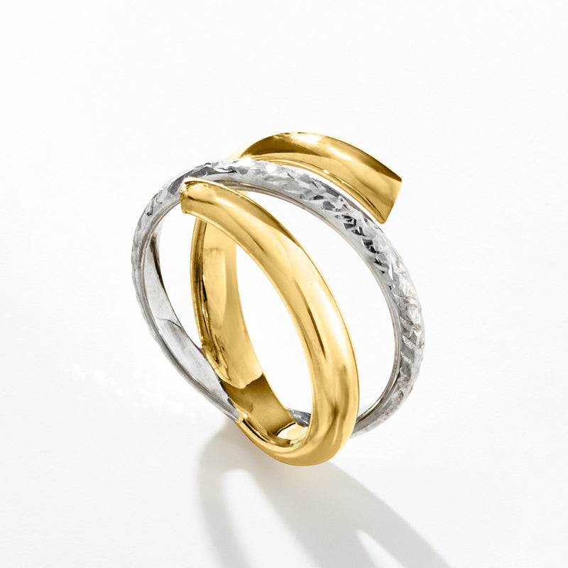 Two-tone gold and silver spiral ring, angled view showing inner polished band