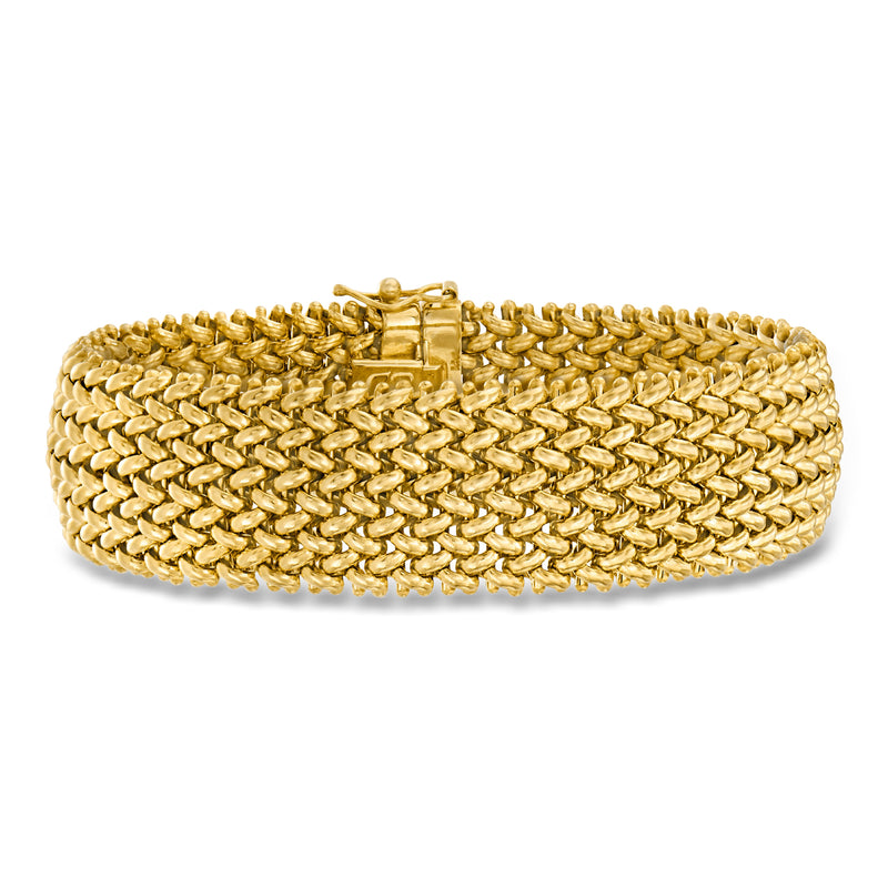 Wide yellow gold link bracelet with riso-style chain and box clasp detail