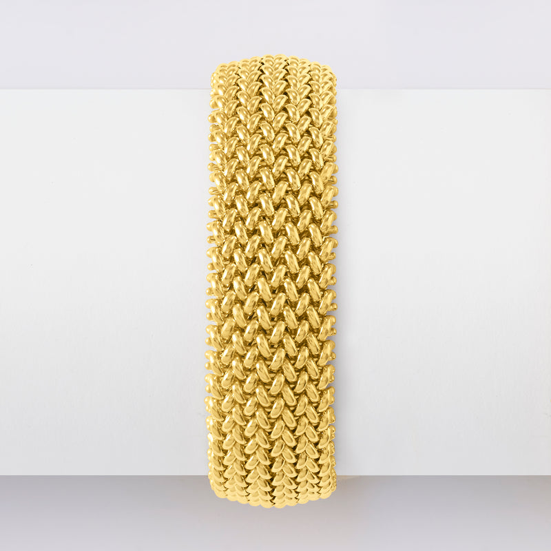 Yellow gold wide riso-link bracelet, rounded profile with textured chain