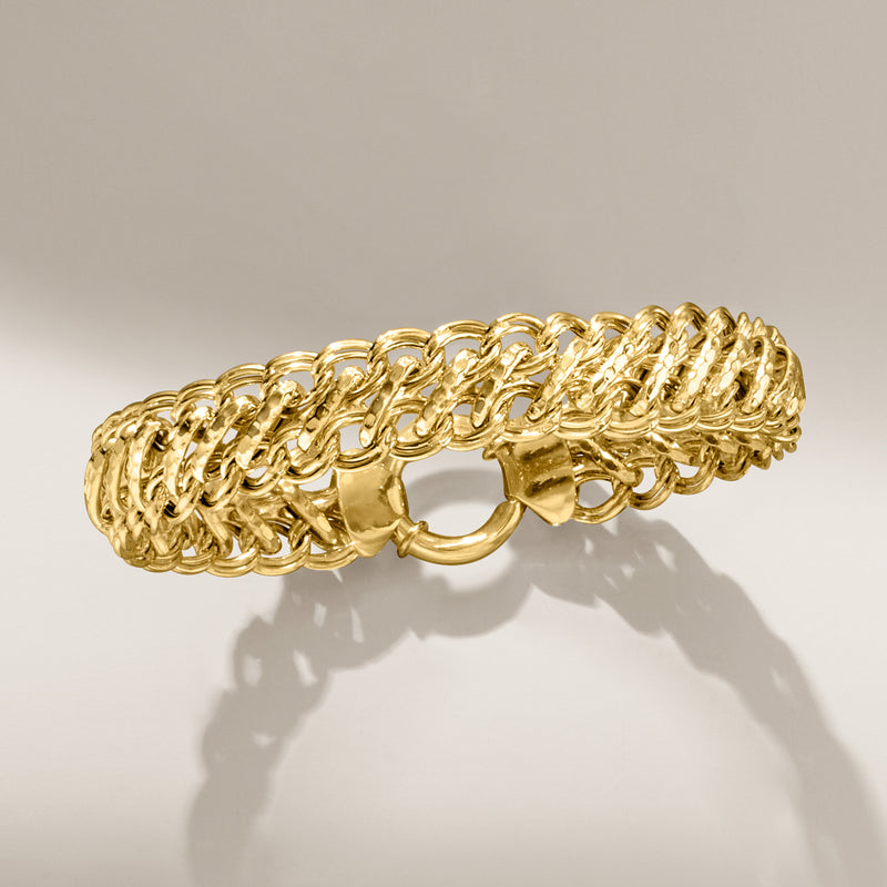 Gold over sterling multi-link bracelet with oval clasp, front view of chain links