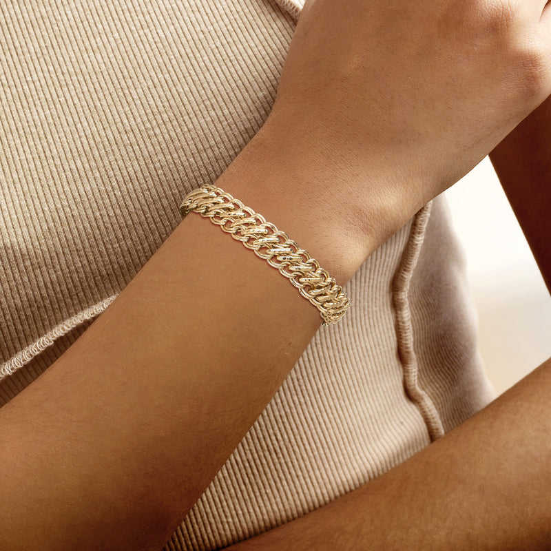 Gold over sterling chain bracelet worn on wrist with multi-link pattern