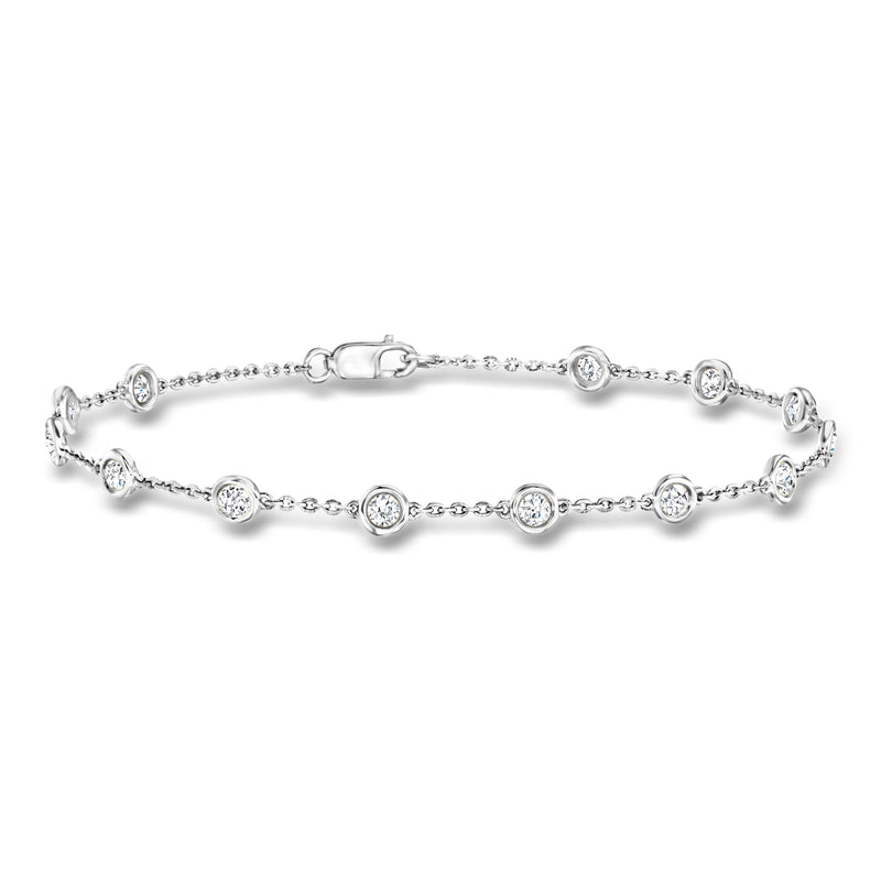14kt white gold diamond station bracelet with bezel-set round stones