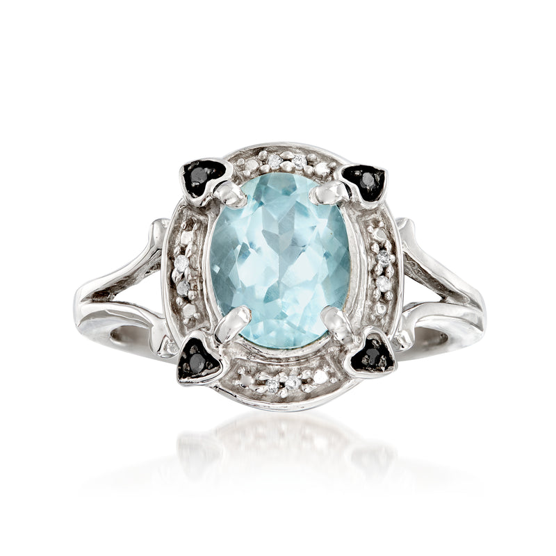 Sterling silver aquamarine oval ring with white diamond halo and black accent prongs