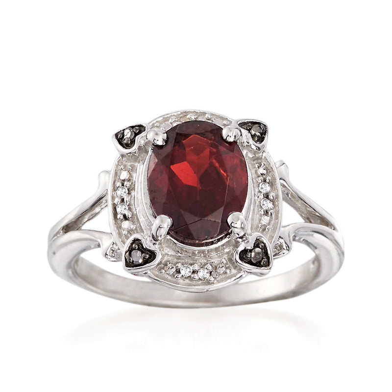 Sterling silver garnet ring with black and white diamond accents