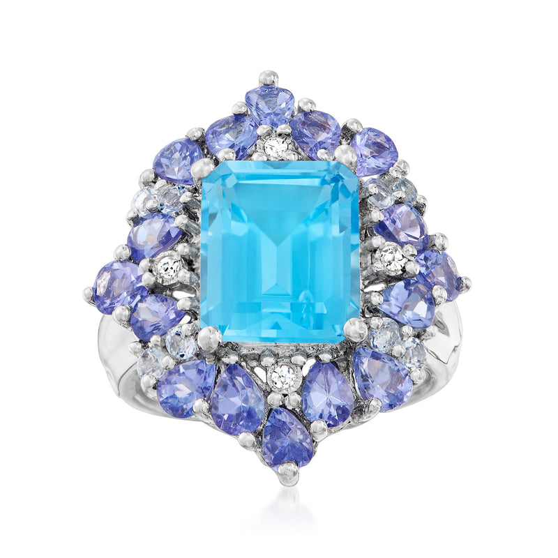 Sterling silver ring with sky-blue square-cut center stone, blue tanzanite halo, diamond accents