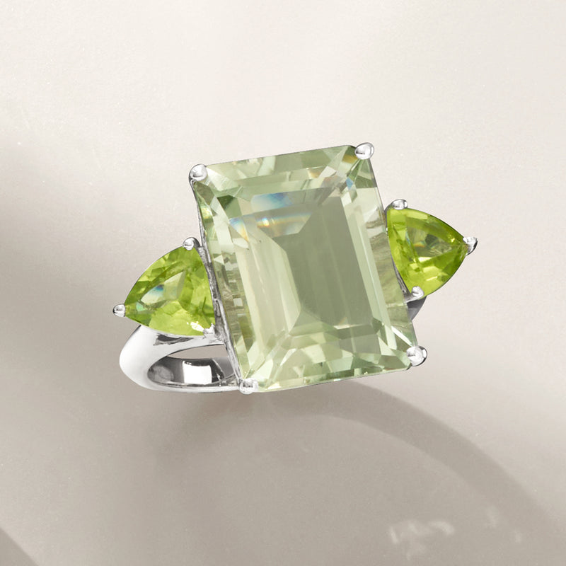 Sterling silver ring with emerald-cut pale green stone and two pear-cut peridot accents