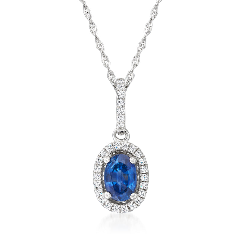 14kt white gold sapphire and diamond pendant necklace with oval blue center stone