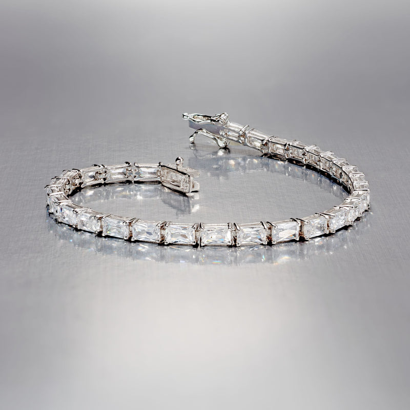 Sterling silver baguette CZ tennis bracelet, angled view of clear rectangular stones