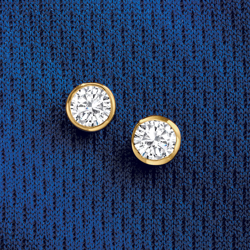 Bezel-set diamond stud earrings in 14kt yellow gold, round stones