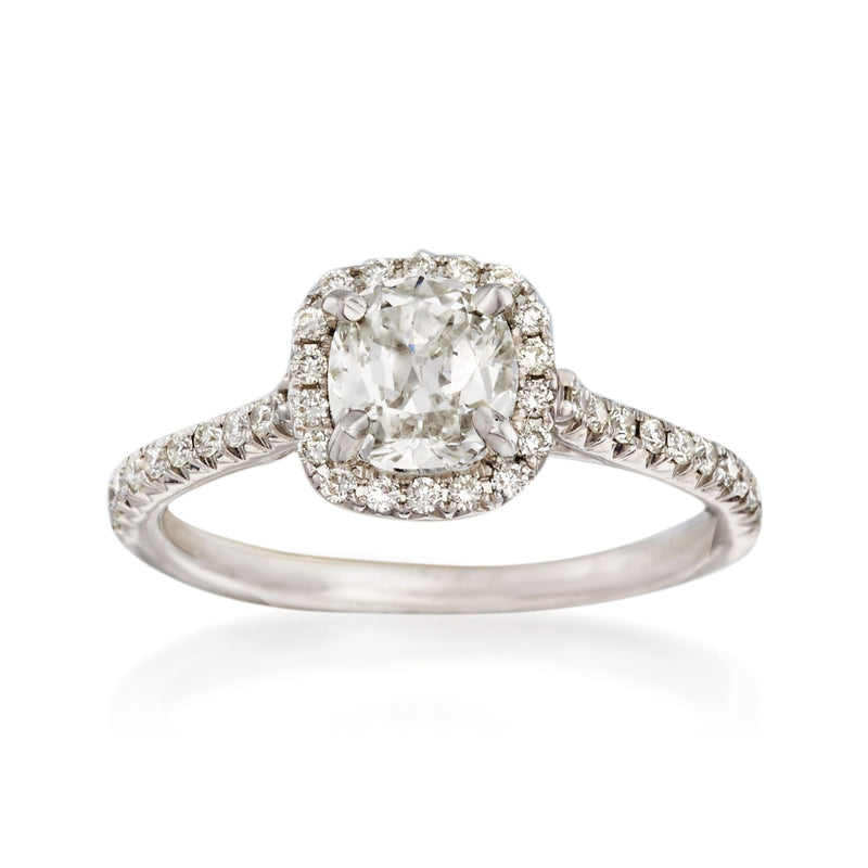 18kt white gold diamond engagement ring with cushion center and round halo