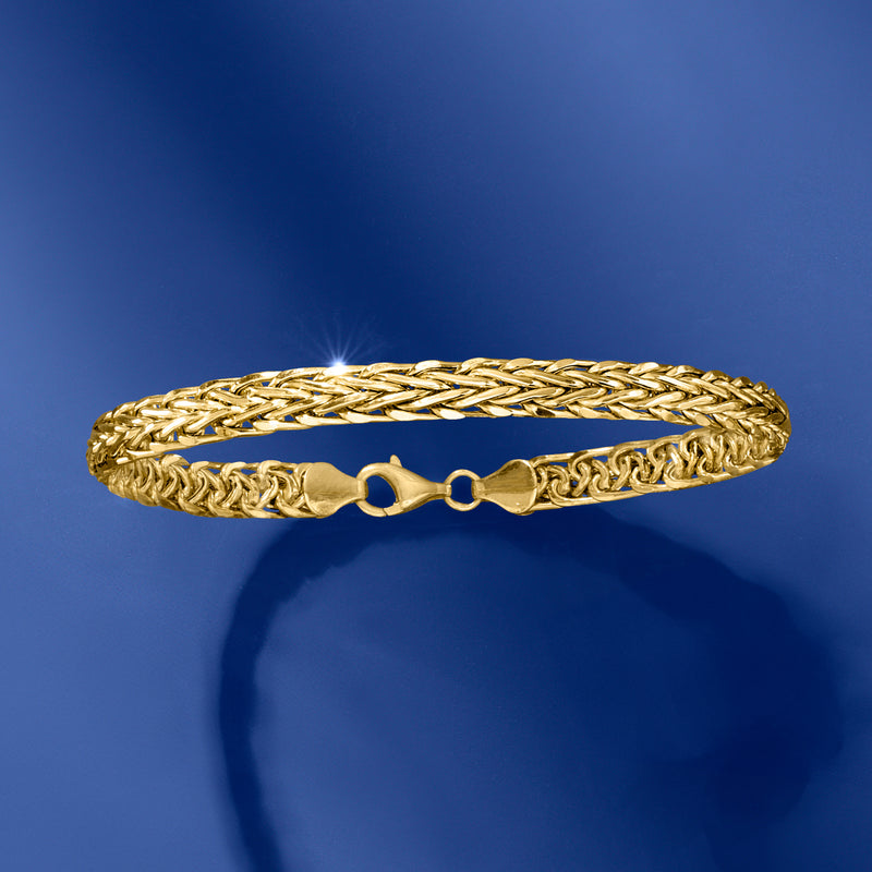 Yellow gold wheat-chain bracelet with braided links and clasp