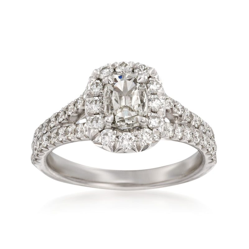 18kt white gold diamond engagement ring with oval center and diamond halo